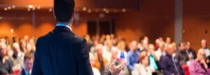 Public speaker in front of audience